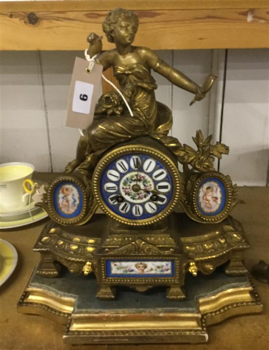 Gilt clock with porcelain plaques
